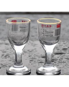 Tall shot glass, painted gold, thickened glass