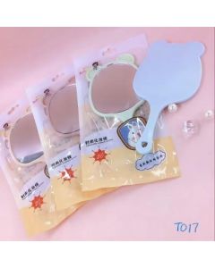 Hand-held mirror in oval bag