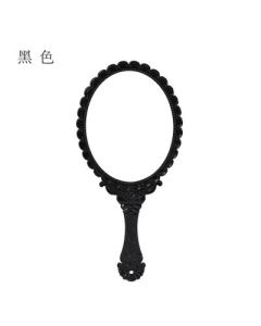 Vanity mirror with patterned handle