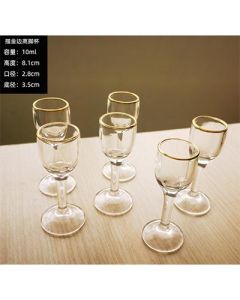 Tall shot glass, painted gold, thickened glass